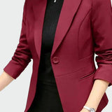 Dora – elegant svart kappa