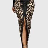Trendig leopard bodycon-maxiklänning med djup v-ringning