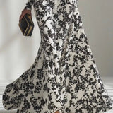 Nikita - Black And White Patterned Stretch Blend Wrap Dress