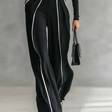 Emma - Elegant two-piece set with a high neck and wide-leg pants