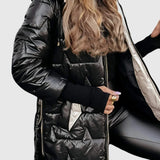Nolven – elegant damkappa med huva